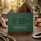 A dark green gift voucher card with the text 'OUTDOOR PROFESSIONAL PRODUCTS' and 'Gift Voucher' lies on a rustic wooden table, surrounded by blurred climbing gear including carabiners and ropes.